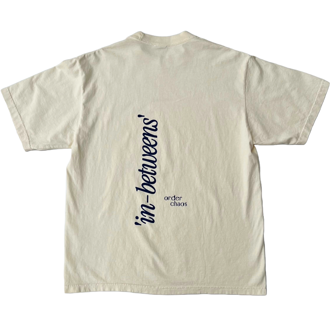 ORDER 'IN-BETWEENS' CHAOS CRÉME TEE